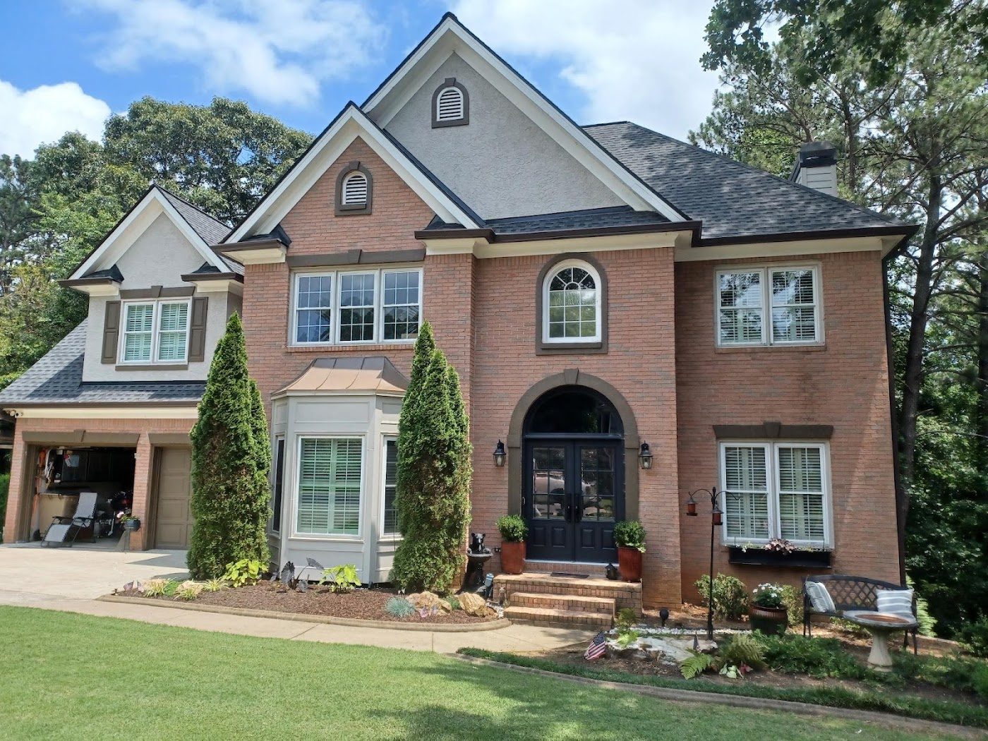 Color-matched gutters on a red brick home