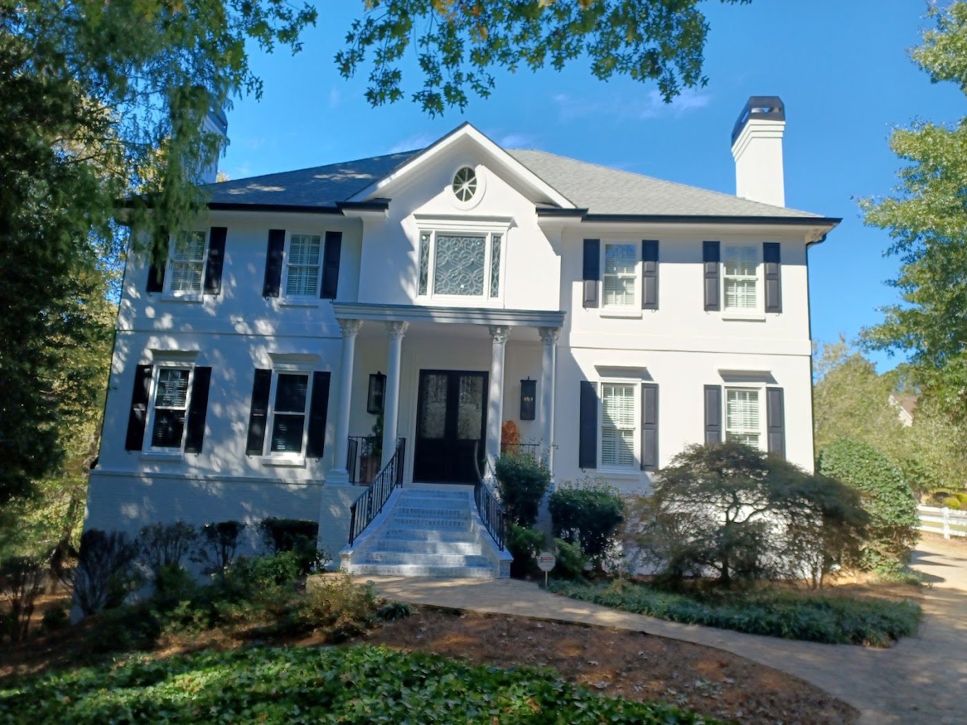 White gutters on a white colonial